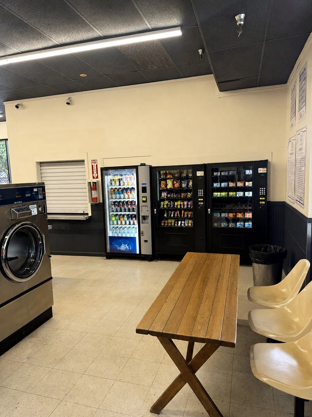 Vending, seating, and supplies area inside Bennett Valley Laundromat